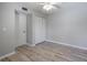 Comfortable bedroom features a ceiling fan, neutral decor, and closet for storage at 814 Spring Lakes Blvd # 14, Bradenton, FL 34210