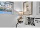 Close-up detail of a stylish bedroom, highlighting the bedside table, decor, and cozy bedding at 946 Charlotte Ave, Sarasota, FL 34237