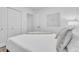 Comfortable bedroom featuring a large bed, fresh linens, and minimalist wall decor at 946 Charlotte Ave, Sarasota, FL 34237