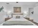 Bright main bedroom featuring a queen bed, bedside tables, and contemporary decor at 946 Charlotte Ave, Sarasota, FL 34237