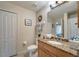 This bathroom offers a single sink vanity and a separate room with a toilet and shower at 1000 San Lino Cir # 1034, Venice, FL 34292