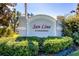 Elegant community sign for San Lino A Condominium surrounded by lush greenery, welcoming residents and visitors at 1000 San Lino Cir # 1034, Venice, FL 34292