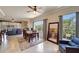Comfortable living room featuring an open layout, tile flooring, and abundant natural light at 1000 San Lino Cir # 1034, Venice, FL 34292