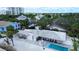 Expansive aerial view of a single-story home with a swimming pool, patio, and manicured landscaping at 1201 Big Oak Ln, Sarasota, FL 34242
