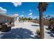 Backyard featuring shell ground cover, paved area, and outdoor seating at 1201 Big Oak Ln, Sarasota, FL 34242