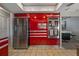 Kitchen features stainless steel refrigerator, oven, and ample storage at 1201 Big Oak Ln, Sarasota, FL 34242