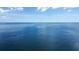 Beautiful ocean view showcasing the vastness of the sea under a bright, partly cloudy sky at 1201 Big Oak Ln, Sarasota, FL 34242