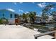 A waterfront view featuring lush tropical foliage and boat dock at 1201 Big Oak Ln, Sarasota, FL 34242