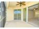 Balcony featuring a view of the lake and sliding glass doors leading to the living area at 1251 Burgos Dr # 303, Sarasota, FL 34238