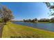 Enjoy the serene water views from this lush, green backyard at 13026 Ramblewood Trl, Bradenton, FL 34211