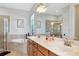 This bathroom features a large tub and a separate shower at 13026 Ramblewood Trl, Bradenton, FL 34211