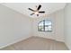 This bedroom features a window that lets in plenty of natural light at 13026 Ramblewood Trl, Bradenton, FL 34211