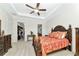This main bedroom features a large bed and plenty of storage at 13026 Ramblewood Trl, Bradenton, FL 34211