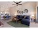 Open concept floorplan showcasing the dining and living room with an adjacent kitchen, perfect for entertaining at 13714 Messina Loop # 202, Bradenton, FL 34211