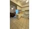 Efficient kitchen featuring white cabinets and plenty of counter space at 1725 Briar Creek Ln, Sarasota, FL 34235