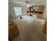 Spacious main bedroom featuring a full wall unit and large window, creating a bright and airy feel at 1725 Briar Creek Ln, Sarasota, FL 34235