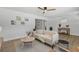 Cozy living room featuring natural light, a comfortable sofa and a stylish decorative arrangement at 1857 Siesta Dr, Sarasota, FL 34239