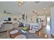 Open concept living space with dining area adjacent to a well-equipped kitchen, great for gatherings at 19293 Breynia Dr, Lutz, FL 33558