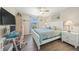 Bedroom offers a workspace and soothing hues with a sea-inspired aesthetic at 19369 Nearpoint Dr, Venice, FL 34292