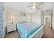 Bedroom offers bright aesthetics, a ceiling fan, and natural light at 19369 Nearpoint Dr, Venice, FL 34292