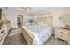 Bedroom with a full kitchenette, comfortable queen size bed, and a dedicated workspace at 19369 Nearpoint Dr, Venice, FL 34292