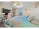 Bedroom offers a workspace and serene hues with a sea-inspired aesthetic at 19369 Nearpoint Dr, Venice, FL 34292