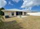 The home has a nice backyard with a stone patio and a privacy fence at 2122 Pleasure Run Dr, Ruskin, FL 33570