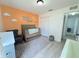 Charming Bedroom with a crib, rocking chair, and a soft rug, creating a warm and inviting space at 2122 Pleasure Run Dr, Ruskin, FL 33570