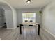 Cozy dining room with lots of natural light, a table, and white chairs at 2122 Pleasure Run Dr, Ruskin, FL 33570