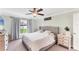 Cozy bedroom featuring soft carpet, natural light, and calming color palette, creating a relaxing atmosphere at 2237 Sadnet Ln, North Port, FL 34286