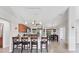Well-appointed kitchen with granite countertops, stainless steel appliances, and bar seating at 2237 Sadnet Ln, North Port, FL 34286