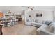 Spacious open layout connecting the living room, kitchen, and dining area, perfect for entertaining at 2237 Sadnet Ln, North Port, FL 34286