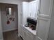 A nice shot of the Kitchen storage cabinets with stainless steel microwave at 2411 Quail Ct, Bradenton, FL 34209