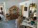Open-concept living space with a mix of dining and seating areas, showcasing bright, natural light at 2617 Riverbluff Pkwy # V151, Sarasota, FL 34231
