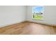 Open bedroom with hardwood flooring, big window and lots of light at 2692 Pretzel Ln, North Port, FL 34286