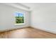 Open bedroom with hardwood flooring, big window and lots of light at 2692 Pretzel Ln, North Port, FL 34286