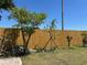 Fenced backyard with growing plants, offering privacy and a connection with nature at 2804 11Th Street E Ct, Bradenton, FL 34208