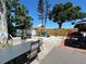 A backyard with a playset and outdoor dining area at 2804 11Th Street E Ct, Bradenton, FL 34208