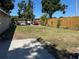 Large backyard with a pergola, trees and fence for privacy at 2804 11Th Street E Ct, Bradenton, FL 34208