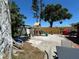 Spacious backyard featuring a playset, a fence for privacy and areas for outdoor recreation at 2804 11Th Street E Ct, Bradenton, FL 34208