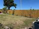 Backyard showcasing a wooden fence, manicured lawn, and outdoor space at 2804 11Th Street E Ct, Bradenton, FL 34208