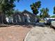 Exterior view of the home showcases a brick driveway and well-maintained landscaping at 2804 11Th Street E Ct, Bradenton, FL 34208