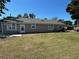 The home's exterior boasts a well-maintained lawn and tidy landscaping at 2804 11Th Street E Ct, Bradenton, FL 34208