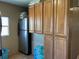 Kitchen features cabinets and a refrigerator at 2804 11Th Street E Ct, Bradenton, FL 34208