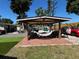 Outdoor patio with a shaded pergola, a comfortable hammock, brick flooring and backyard views at 2804 11Th Street E Ct, Bradenton, FL 34208