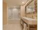 This bathroom offers a shower and tub combo with double sinks and plenty of storage at 3401 54Th W Dr # 201, Bradenton, FL 34210