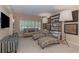 Cozy living room features a mix of patterned seating, large lamps, and decorative wall art at 3401 54Th W Dr # 201, Bradenton, FL 34210