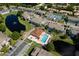 Aerial view of Mirror Lake Condominiums showcasing a pool, ponds, and the well-manicured community at 3539 59Th W Ave # 3539, Bradenton, FL 34210