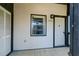 Inviting entryway with neutral tones, updated light fixture, and private entrance at 3539 59Th W Ave # 3539, Bradenton, FL 34210