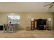 Comfortable living room with dining table and entertainment area at 3539 59Th W Ave # 3539, Bradenton, FL 34210